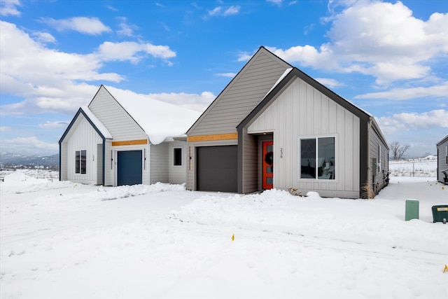 modern farmhouse featuring a garage