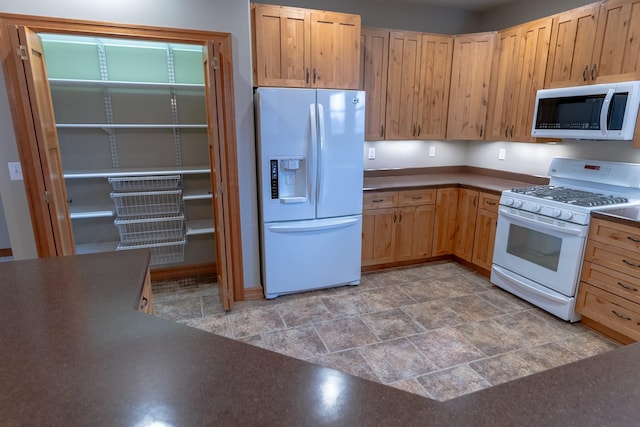 kitchen featuring white appliances