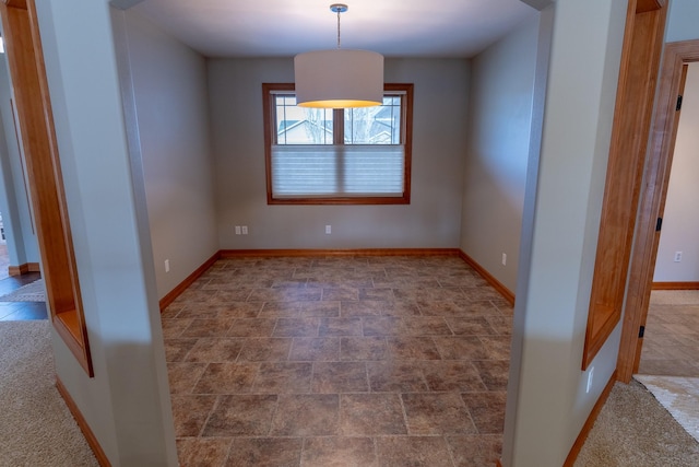 view of unfurnished dining area