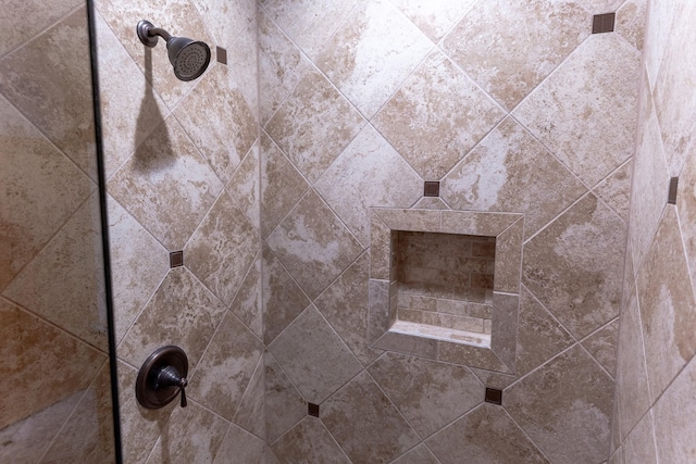 details featuring a tile shower