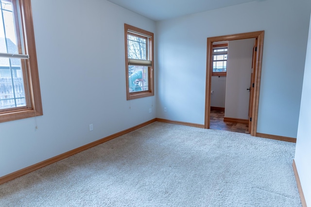 empty room with carpet flooring