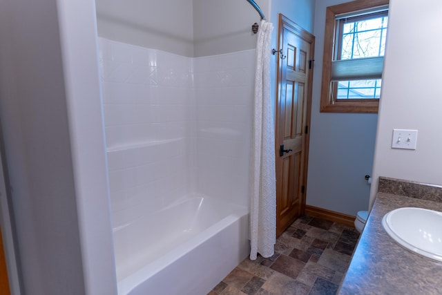 full bathroom featuring vanity, toilet, and shower / bath combo with shower curtain