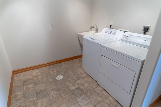 washroom featuring separate washer and dryer