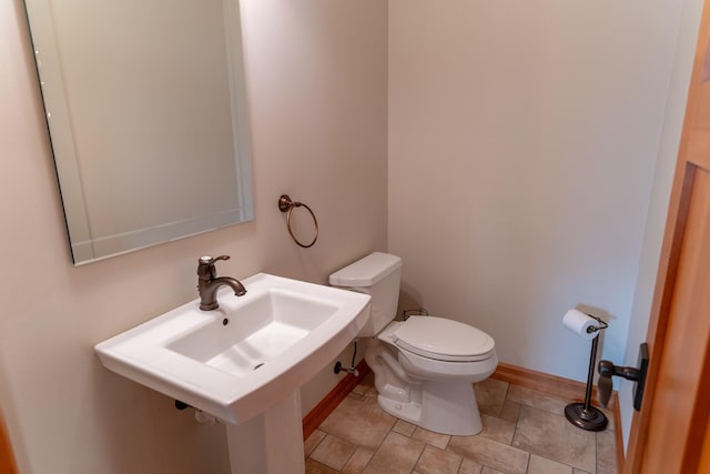 bathroom featuring toilet