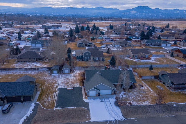 birds eye view of property featuring a mountain view