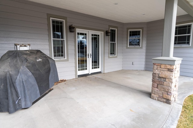 view of patio with a grill