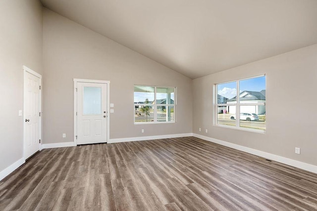 interior space with high vaulted ceiling