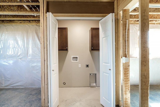 laundry room featuring hookup for an electric dryer, washer hookup, and cabinets