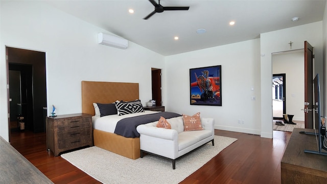 bedroom featuring a wall unit AC, ceiling fan, and dark hardwood / wood-style flooring