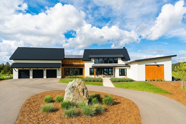 view of front of property featuring a garage