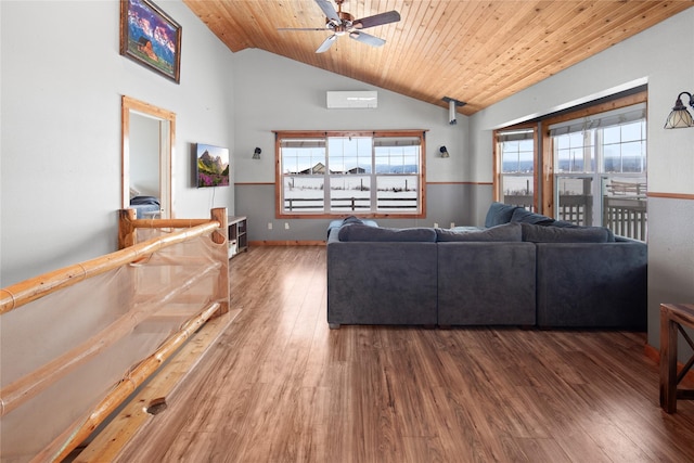 living room with a wealth of natural light, wooden ceiling, and hardwood / wood-style flooring