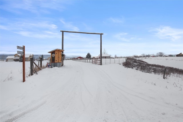 view of yard covered in snow