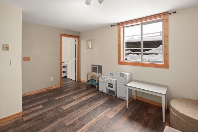 misc room with dark hardwood / wood-style flooring