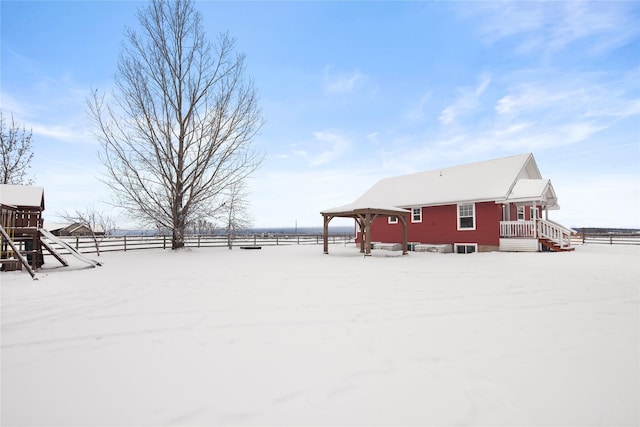 view of yard layered in snow