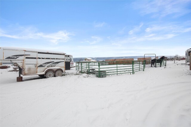 view of yard covered in snow