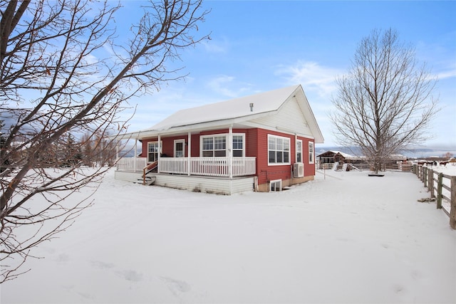 view of snow covered property