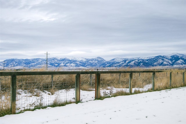 mountain view featuring a rural view