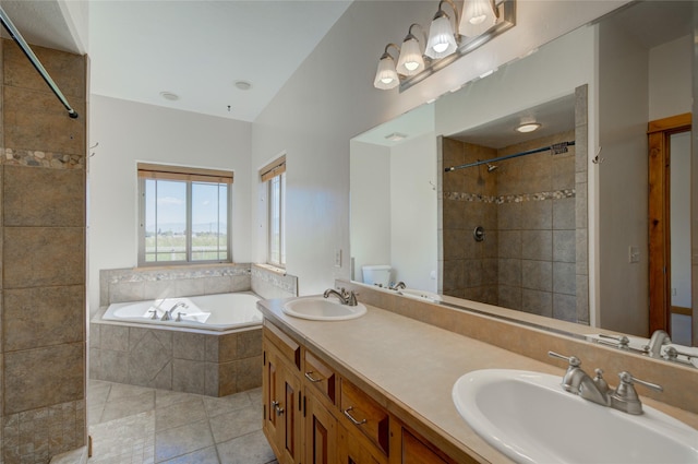 full bathroom featuring tile patterned floors, plus walk in shower, vanity, and toilet