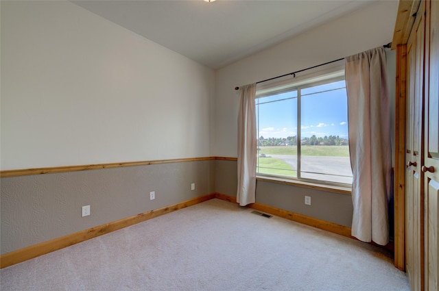 view of carpeted spare room