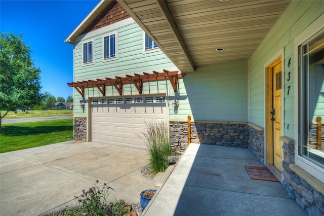 view of patio featuring a garage