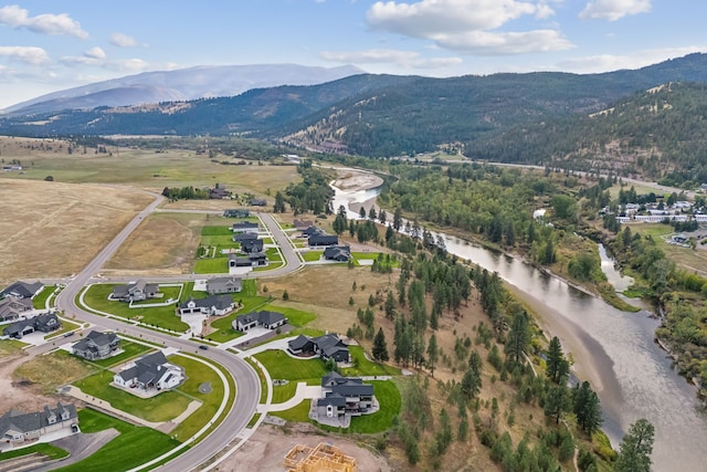 aerial view with a water and mountain view