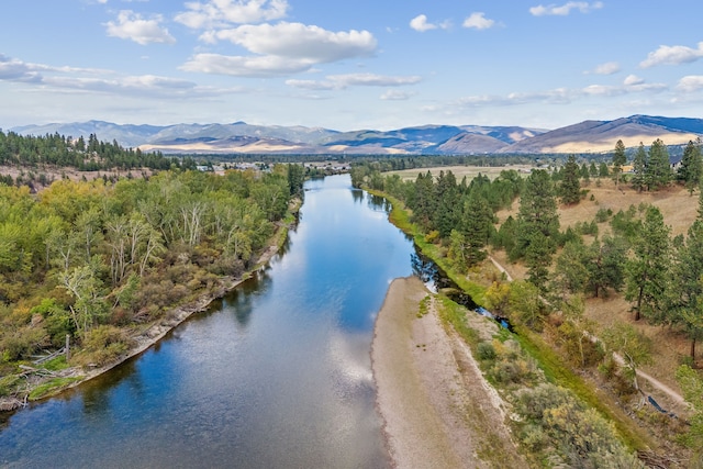 bird's eye view featuring a water and mountain view