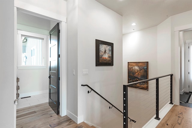 hallway featuring light wood-type flooring