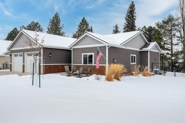 view of front of property featuring central air condition unit