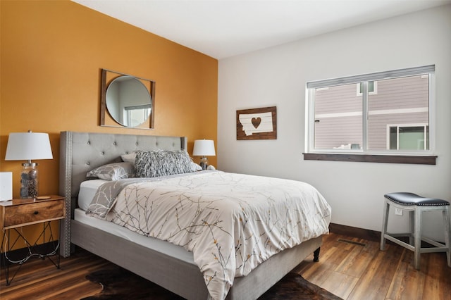 bedroom with wood-type flooring