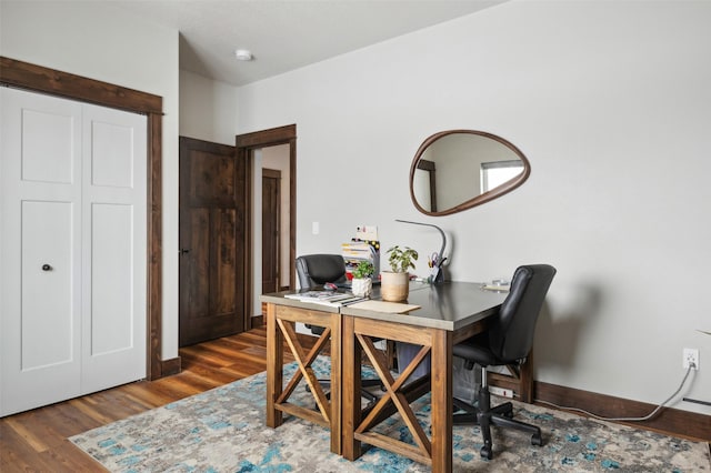 office space featuring dark wood-type flooring