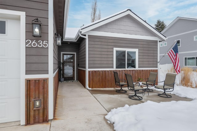 view of snow covered patio