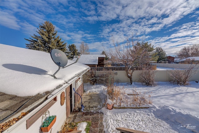 view of yard covered in snow