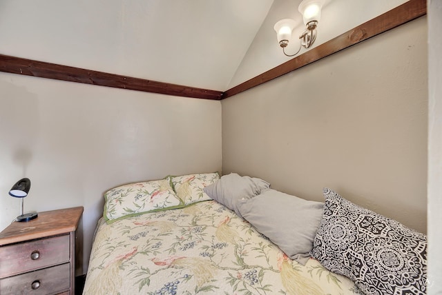 bedroom with vaulted ceiling