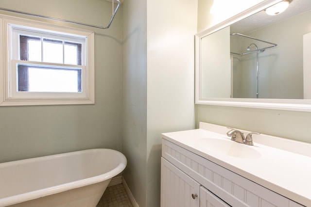 bathroom featuring vanity and shower with separate bathtub