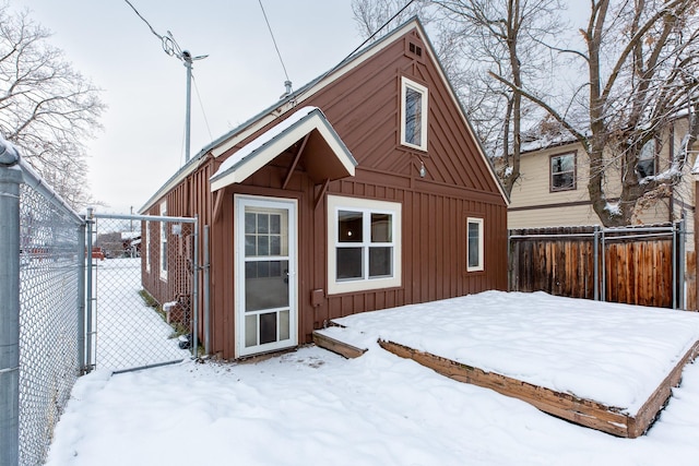 view of snow covered house