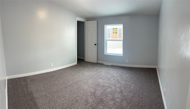 empty room featuring carpet