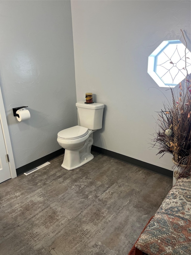 bathroom featuring toilet