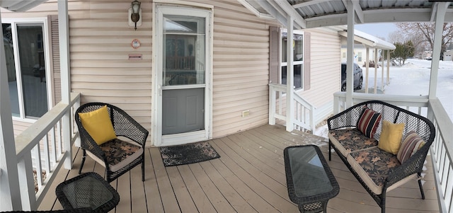 view of snow covered deck