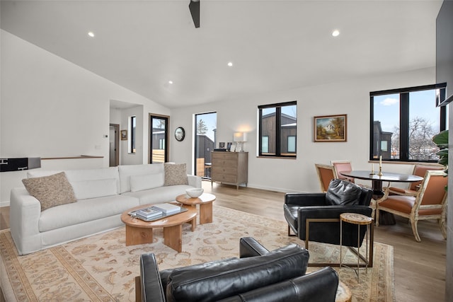 124 W 2nd St Unit B, Whitefish, MT 59937 - living room with light wood-style floors, lofted ceiling, recessed lighting, baseboards, and ceiling fan