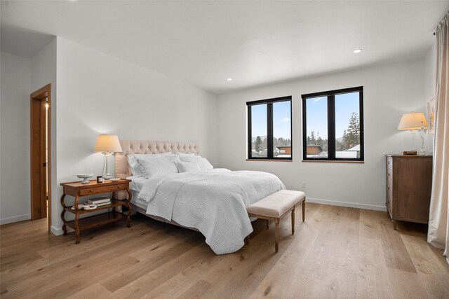 124 W 2nd St Unit B, Whitefish, MT 59937 - bedroom with light wood finished floors, recessed lighting, and baseboards