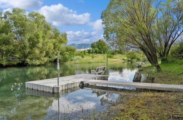 124 W 2nd St Unit B, Whitefish, MT 59937 - dock featuring a water and mountain view