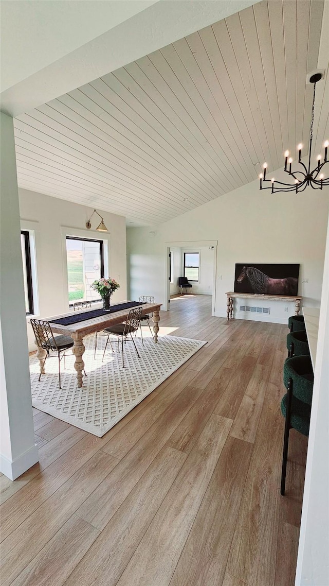 rec room featuring a chandelier, wooden ceiling, vaulted ceiling, and wood finished floors