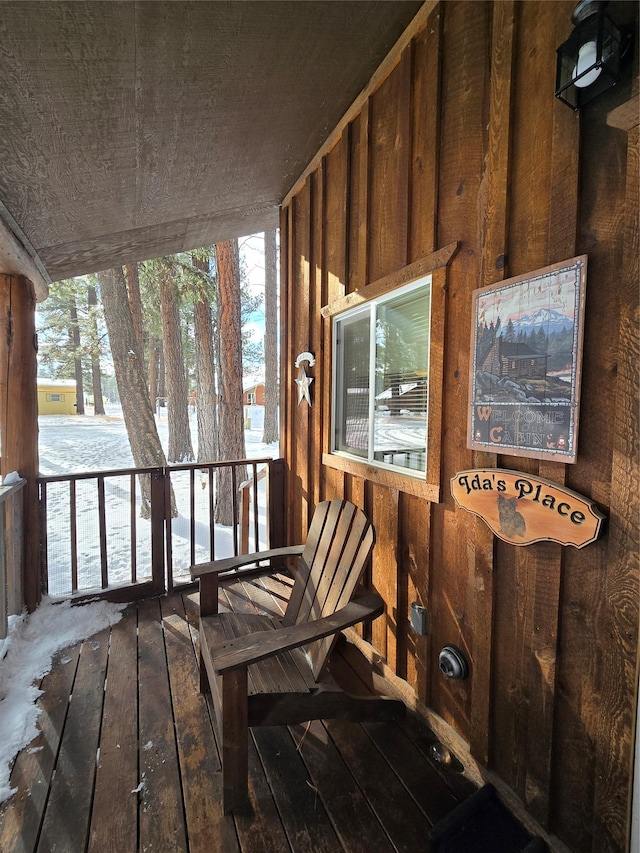 view of snow covered deck