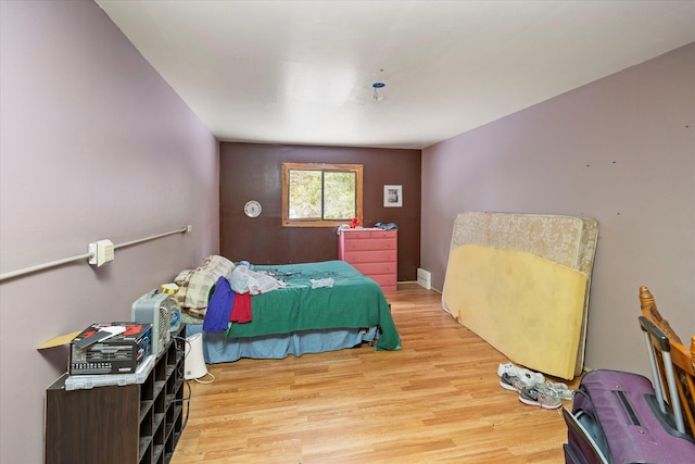 bedroom with light wood-type flooring