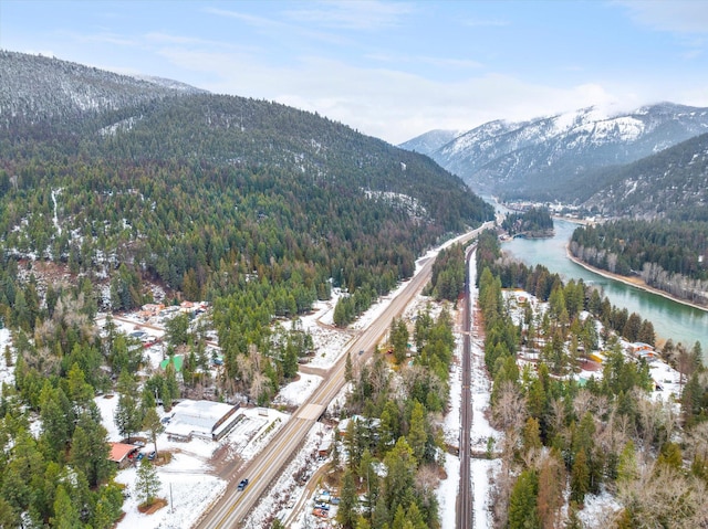 bird's eye view featuring a water and mountain view