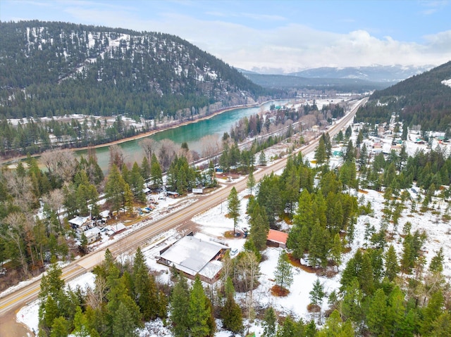 bird's eye view with a water and mountain view