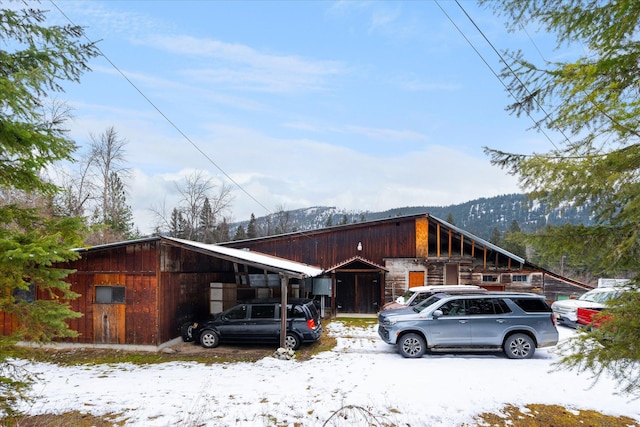 view of front of property with a mountain view