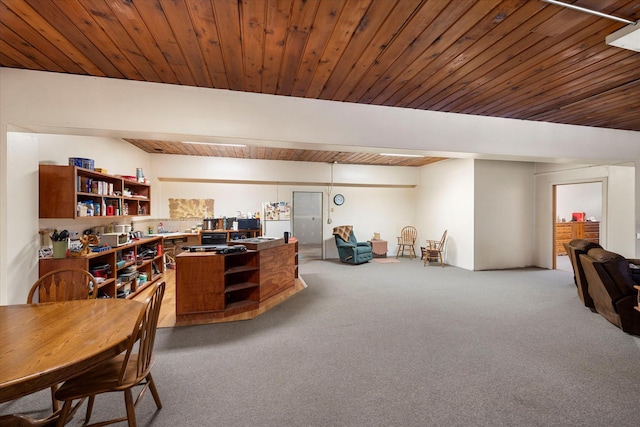 carpeted home office with wooden ceiling