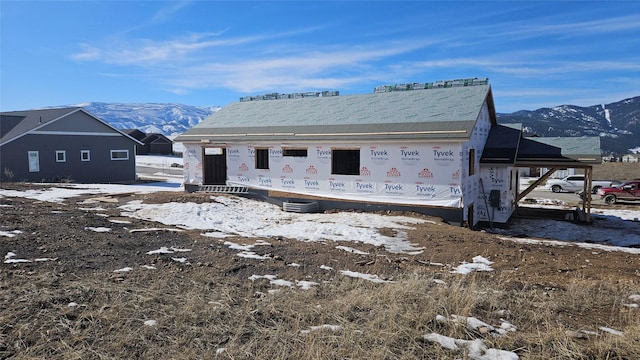 exterior space featuring a mountain view