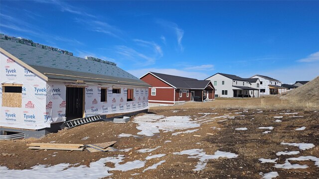 view of snow covered property